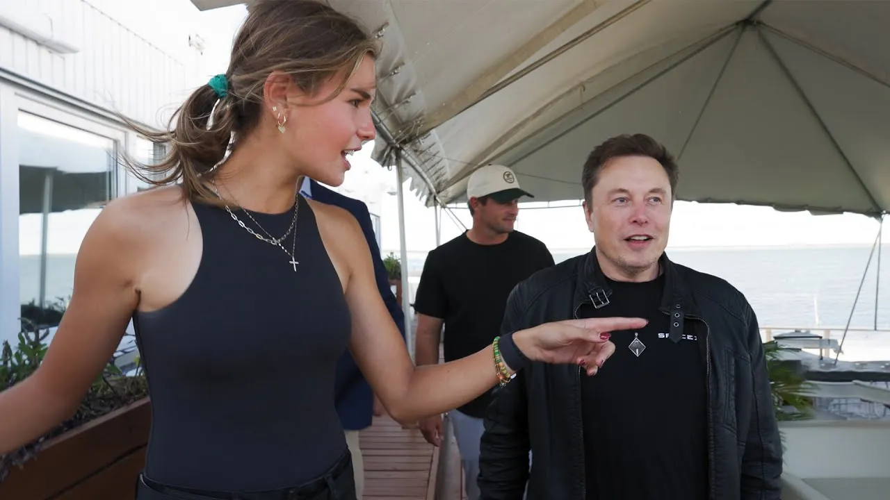 Video thumbnail from the Kai Trump channel: Kai with Elon Musk under a tent.